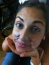 Big load of cum splattered over her face after blowjob
