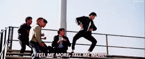Tell Me More John Travolta GIF - TellMeMore JohnTravolta Grease - Discover  &amp; Share GIFs