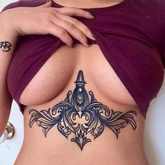 under-boob-tattoos-2-15.jpg.15f04bfab170785aa46c0968e6c9d84f.jpg